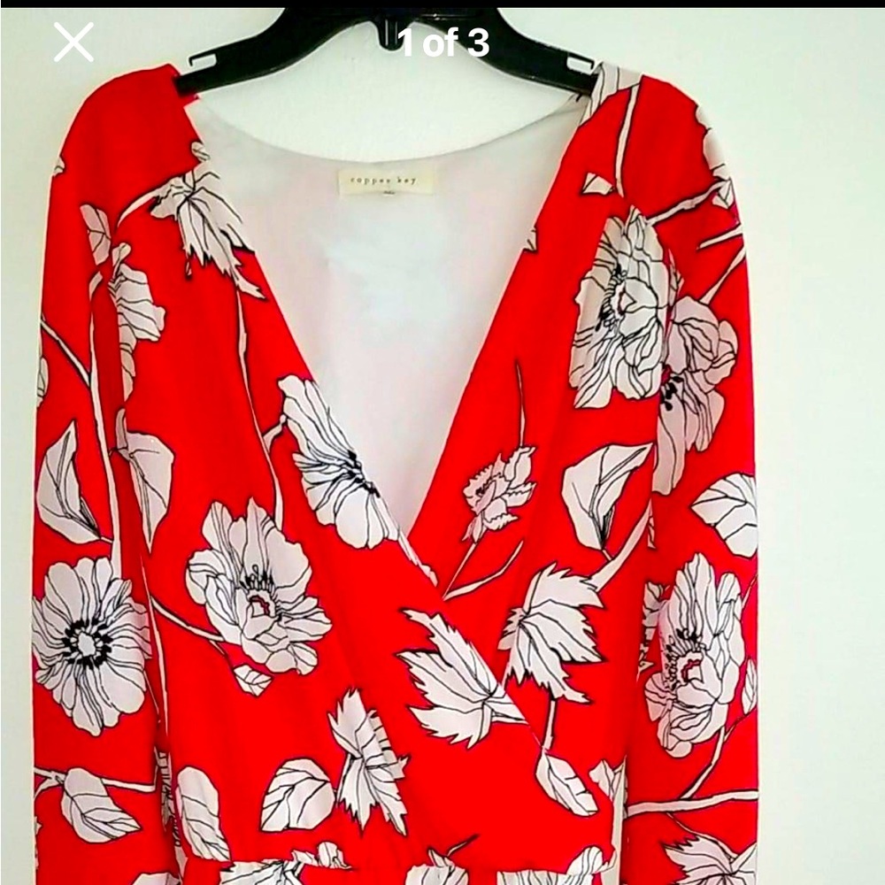 A beautiful floral romper! Perfect for spring and summer! Dress up or down!